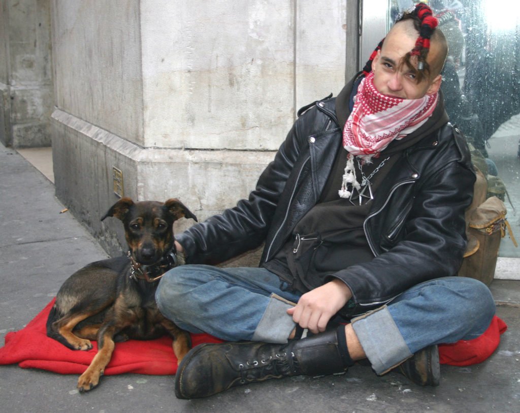 Homeless person with dog,, street pets