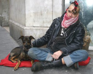 Homeless person with dog,, street pets